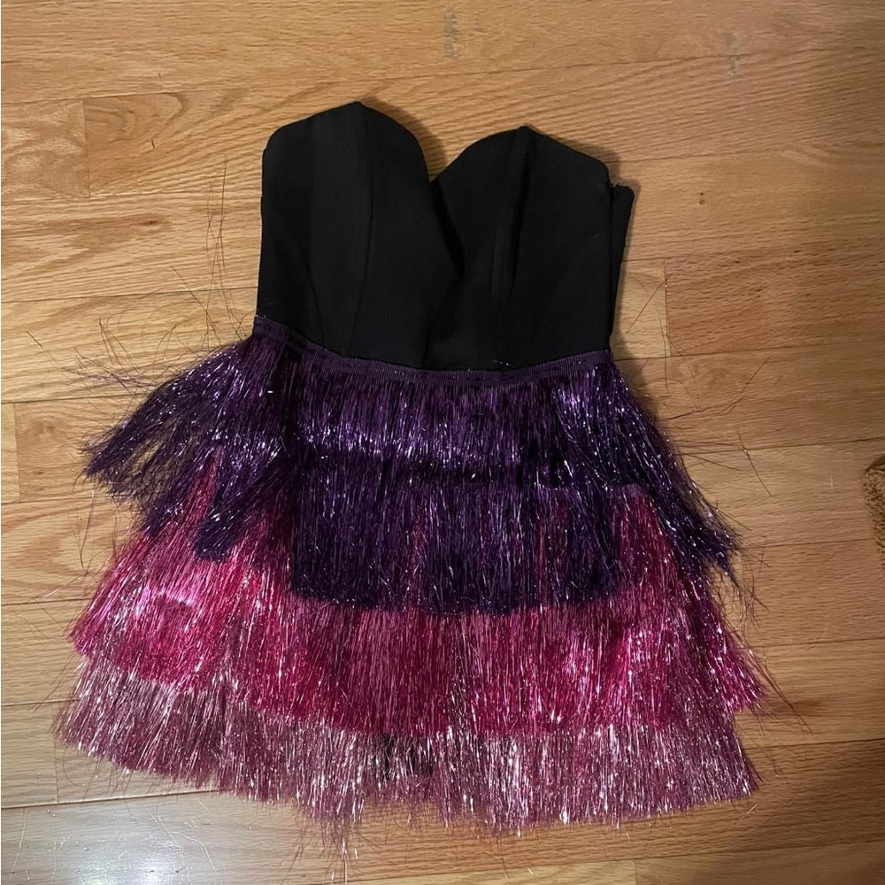 Size small but fits more like XS.